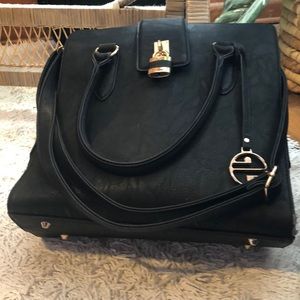Large purse used once. Has 4 pockets